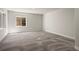 Unfinished basement provides a canvas for customization with neutral carpet and ample natural light at 5302 Pinehurst Dr, Boulder, CO 80301