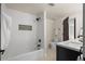 Bright bathroom with white subway tile and black fixtures create a clean, modern aesthetic at 5302 Pinehurst Dr, Boulder, CO 80301