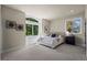 Serene bedroom with large windows and neutral decor at 5302 Pinehurst Dr, Boulder, CO 80301