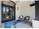 Stylish front porch with comfortable seating, a decorative rug, and an inviting ambiance at 5302 Pinehurst Dr, Boulder, CO 80301