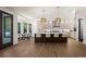Modern kitchen featuring a large island with counter seating and stylish pendant lighting at 5302 Pinehurst Dr, Boulder, CO 80301