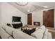 Inviting living room with vaulted ceiling, fireplace, and comfortable seating at 5302 Pinehurst Dr, Boulder, CO 80301