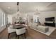 Spacious open floor plan featuring kitchen, dining, and living areas at 5302 Pinehurst Dr, Boulder, CO 80301