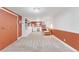Spacious finished basement with built-in shelving, cozy seating area, and ample storage at 2734 King St, Denver, CO 80211