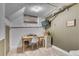 Attic office space with ample natural light and a minimalist aesthetic, perfect for productivity at 2734 King St, Denver, CO 80211
