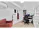 Bright home office with natural light, comfortable seating, and a functional workspace at 2734 King St, Denver, CO 80211