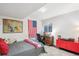 Bedroom with a bed, desk, shag carpet, and ample decor for a comfortable and stylish space at 8170 E Phillips Cir, Centennial, CO 80112