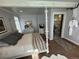 Comfortable bedroom with en-suite bathroom, four poster bed and hardwood floors at 614 Rose St, Georgetown, CO 80444