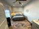 Cozy bedroom featuring a comfortable bed, stylish rug, and natural light at 614 Rose St, Georgetown, CO 80444