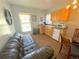 Cozy living space with compact kitchenette, leather sofa, table and chairs at 614 Rose St, Georgetown, CO 80444