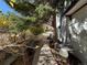 Pleasant outdoor seating area with mature tree coverage and street views at 614 Rose St, Georgetown, CO 80444