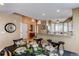 Elegant dining space open to the foyer and breakfast nook at 3644 Rosewalk Cir, Highlands Ranch, CO 80129