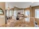 Bright kitchen with granite countertops, modern appliances, and sunny breakfast nook at 3644 Rosewalk Cir, Highlands Ranch, CO 80129