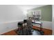 Home office offers an L-shaped desk, ergonomic chair, and modern decor for a comfortable workspace at 10405 Dresden St, Firestone, CO 80504