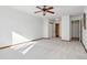 Spacious bedroom with bright, natural light and neutral carpet at 655 S Alton Way # 6A, Denver, CO 80247