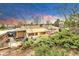Backyard with a patio, grill, and ample space for outdoor living at 7727 W 81St Pl, Arvada, CO 80005