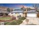 Charming single-story home with solar panels, lovely yard, and a one-car garage at 7727 W 81St Pl, Arvada, CO 80005