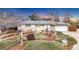 Charming ranch-style house featuring solar panels, well-maintained landscaping, and inviting curb appeal at 7727 W 81St Pl, Arvada, CO 80005