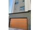 Garage door with house number on modern townhome at 10150 Belvedere Loop, Lone Tree, CO 80124