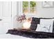 A cozy bedside table with modern lamp and decorative accessories at 2875 Leyden St, Denver, CO 80207