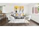 Bright living room featuring hardwood floors, contemporary furniture, and stylish wall art at 2875 Leyden St, Denver, CO 80207