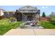 Backyard with a gazebo, deck, and patio area perfect for outdoor entertaining and relaxation at 11011 Kendall Way, Westminster, CO 80020