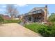 Spacious backyard featuring a large patio, well-maintained lawn, and mature trees at 11011 Kendall Way, Westminster, CO 80020
