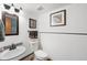 Cozy bathroom with decorative towels and framed art for a relaxing ambiance at 11011 Kendall Way, Westminster, CO 80020