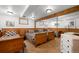 Bedroom with three beds, mirrored closet, and wood-paneled walls at 11011 Kendall Way, Westminster, CO 80020