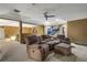 An expansive bonus room featuring comfortable seating, ample space, and great entertainment possibilities at 11345 W 38Th Ave, Wheat Ridge, CO 80033