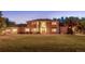 Charming brick residence boasting a large lawn and mature trees at 11345 W 38Th Ave, Wheat Ridge, CO 80033