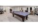 Finished basement with a luxurious ping pong table with claw feet for entertainment and Gathering fun at 12451 Turquoise Terrace Pl, Castle Pines, CO 80108