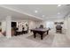 Finished basement with a ping pong table and entertainment area at 12451 Turquoise Terrace Pl, Castle Pines, CO 80108