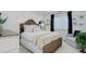 Cozy bedroom featuring a wooden bed frame and neutral decor at 12451 Turquoise Terrace Pl, Castle Pines, CO 80108