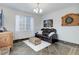 Relaxing living room with stone floors, darts, and comfortable seating at 12451 Turquoise Terrace Pl, Castle Pines, CO 80108