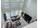 Overhead view of bright living room with comfortable seating and natural light at 12451 Turquoise Terrace Pl, Castle Pines, CO 80108