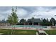 Inviting pool area with comfortable lounge chairs and well-manicured surroundings, perfect for relaxation and recreation at 12451 Turquoise Terrace Pl, Castle Pines, CO 80108