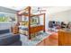Bedroom showcases four-poster bed, ceiling fan, and a work-from-home setup at 6110 Raleigh Cir, Castle Rock, CO 80104