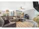 Comfortable living room with a large gray sectional sofa and hardwood floors at 6110 Raleigh Cir, Castle Rock, CO 80104