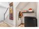 This mudroom features hardwood floors and a small storage area under the staircase at 6110 Raleigh Cir, Castle Rock, CO 80104