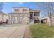 Charming two-story home with a two-car garage, inviting porch, and well-maintained landscaping at 20466 Willowbend Ln, Parker, CO 80138