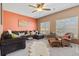 Cozy living room with comfortable seating, large windows, and a stylish decor for relaxation and entertainment at 20466 Willowbend Ln, Parker, CO 80138