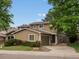Lovely two-story home with attached garage, mature landscaping, and a welcoming curb appeal at 12599 Elm St, Thornton, CO 80241