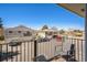 Balcony view of adjacent townhomes and community parking at 1250 S Monaco Pkwy # 44, Denver, CO 80224