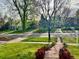 Residential neighborhood featuring mature trees and attractive landscaping at 1315 Grape St, Denver, CO 80220