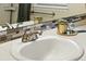 Bathroom vanity with quartz countertop, decor and stylish fixtures at 1978 Newland Ct, Lakewood, CO 80214