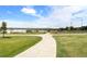 Picturesque walking path through a lush green space and park near the residence at 1978 Newland Ct, Lakewood, CO 80214