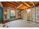 Insulated basement space with two windows at 1573 S Dexter Way, Denver, CO 80222