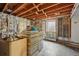 Insulated basement walls with a single window at 1573 S Dexter Way, Denver, CO 80222