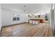 Bright living room with hardwood floors, large windows and minimalist decor at 1573 S Dexter Way, Denver, CO 80222